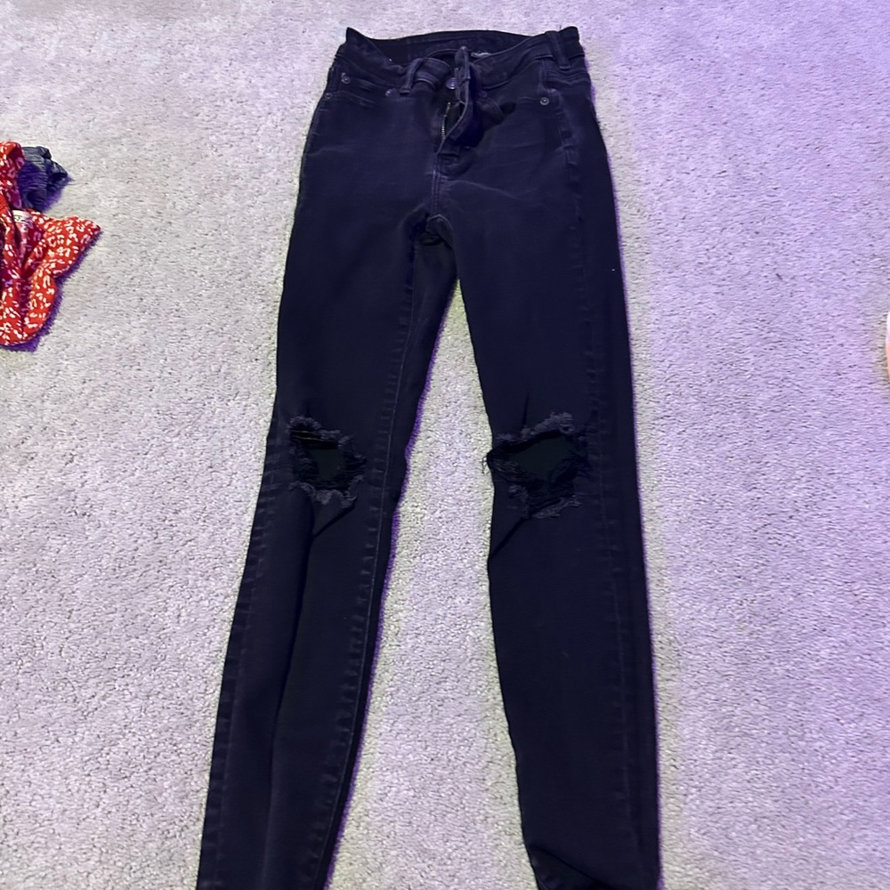 Black ripped jeans
